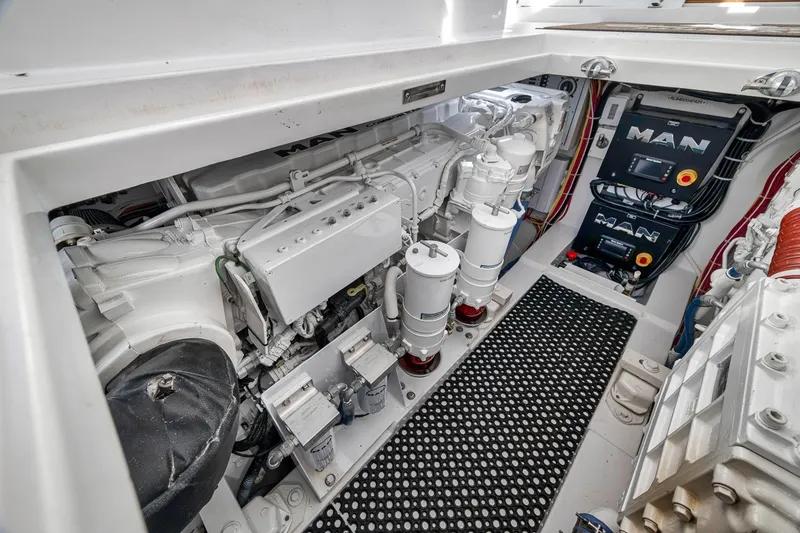 Slide: The Image of Engine room of 2025 Release Boatworks 46 Express, featuring advanced MAN engines and components. - 41