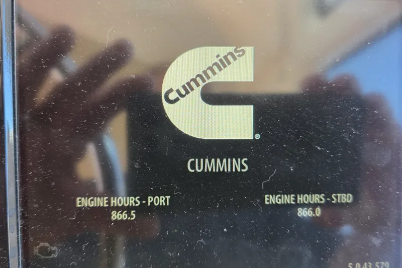 Slide: The Image of Display showing Cummins engine hours for Tiara Yachts 3900 Coronet, 2016 model. - 27