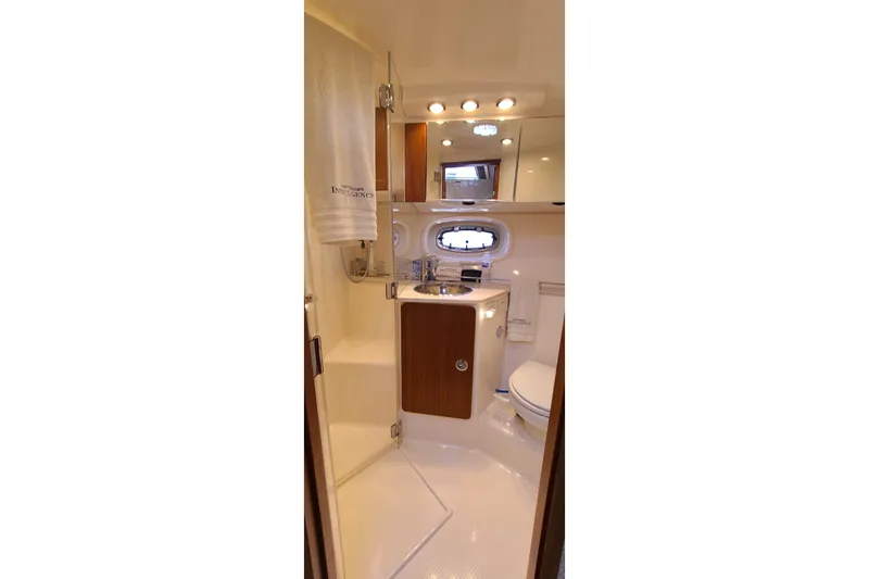 Slide: The Image of Luxurious bathroom interior of 2016 Tiara Yachts 3900 Coronet, featuring elegant fixtures and lighting. - 26