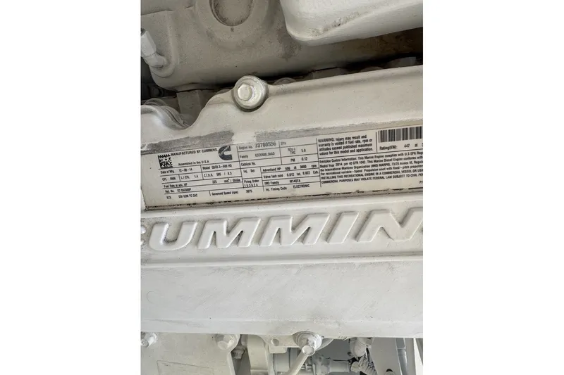 Slide: The Image of Engine label on a 2016 Tiara Yachts 3900 Coronet, featuring Cummins branding. - 30