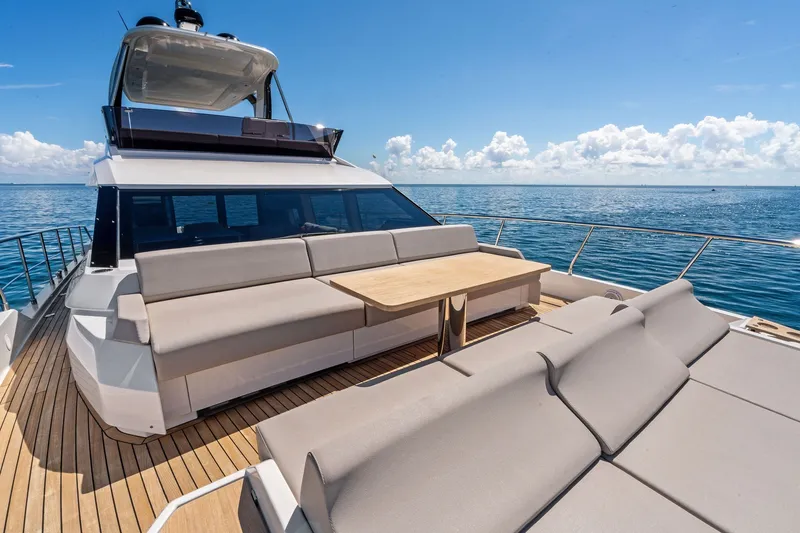 Slide: The Image of Luxurious 2025 Ferretti Yachts 580 with spacious deck and ocean view. - 14