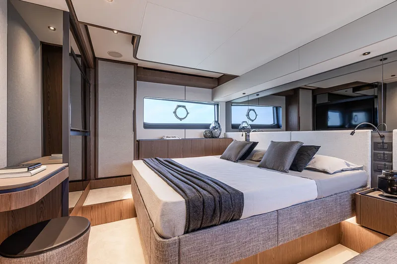 Slide: The Image of Luxurious bedroom interior of 2025 Ferretti Yachts 580, featuring modern design and elegant furnishings. - 27