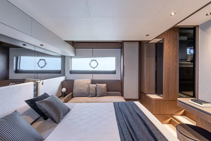 Slide: The Image of Luxurious interior of 2025 Ferretti Yachts 580, featuring elegant wood finishes and modern design. - 29