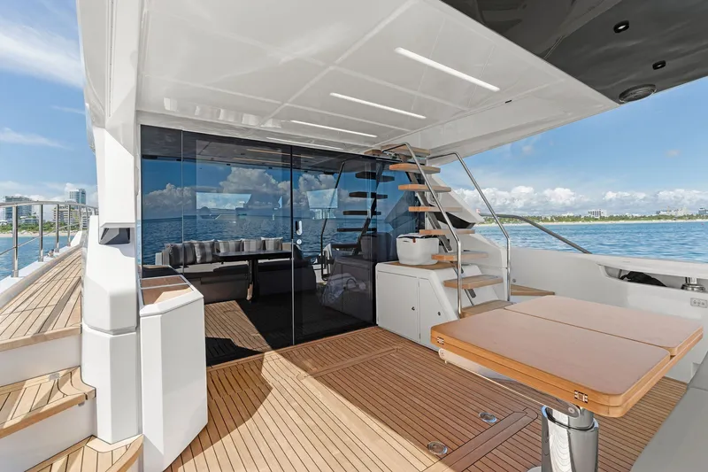 Slide: The Image of Luxurious 2025 Ferretti Yachts 580 deck with modern design and ocean view. - 19
