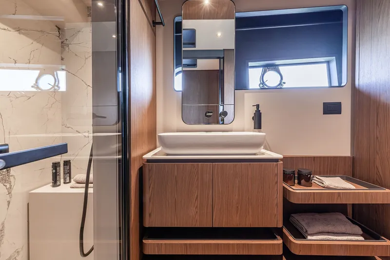 Slide: The Image of Luxurious bathroom interior of 2025 Ferretti Yachts 580 with modern fixtures and elegant design. - 36