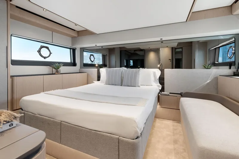 Slide: The Image of Luxurious bedroom interior of 2025 Ferretti Yachts 580, featuring modern design and elegant furnishings. - 49