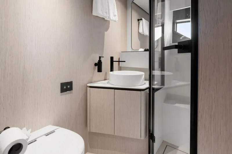 Slide: The Image of Modern bathroom interior on 2025 Ferretti Yachts 580, featuring sleek fixtures and minimalist design. - 61