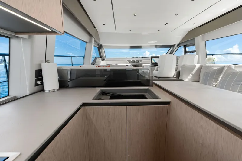 Slide: The Image of Luxurious interior of 2025 Ferretti Yachts 580 with modern design and panoramic windows. - 47