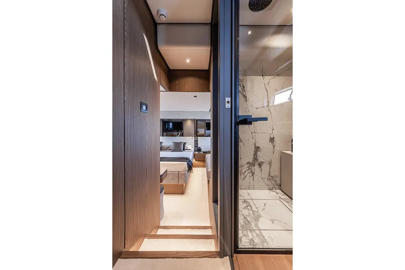 Slide: The Image of Luxurious interior of 2025 Ferretti Yachts 580, featuring elegant wood and marble finishes. - 35