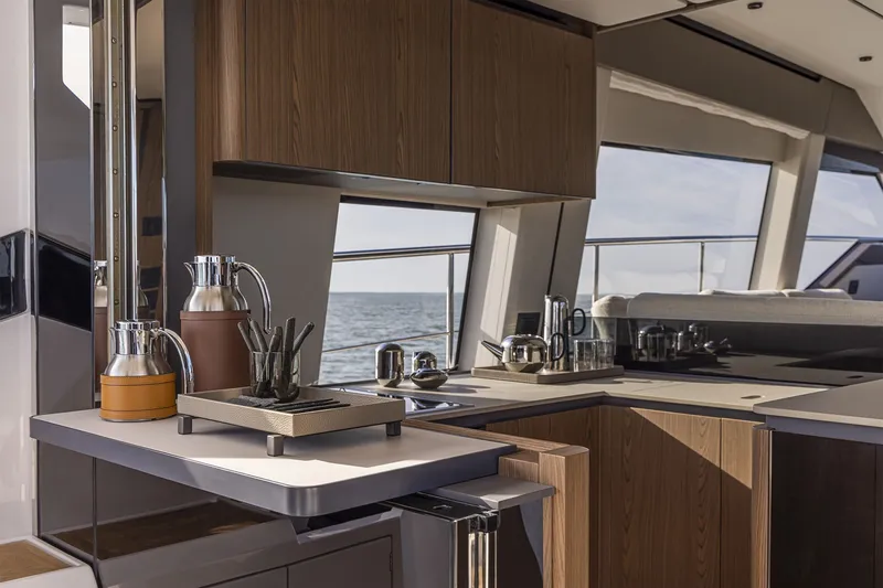 Slide: The Image of Luxurious kitchen interior of 2025 Ferretti Yachts 580, featuring modern design and ocean view. - 24