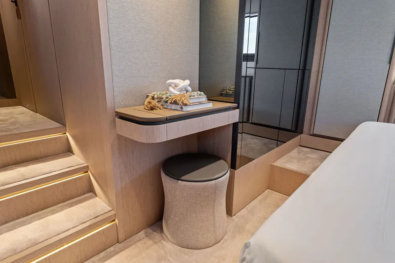 Slide: The Image of Luxurious interior of 2025 Ferretti Yachts 580, featuring elegant wood finishes and modern decor. - 55