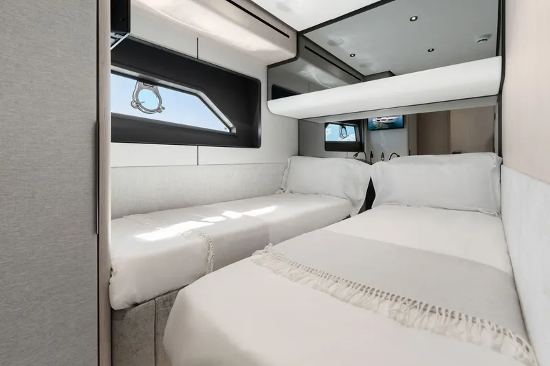 Slide: The Image of Luxurious twin cabin interior of 2025 Ferretti Yachts 580, featuring modern design and comfort. - 65