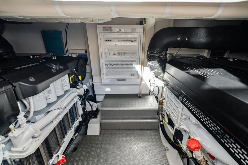 Slide: The Image of Engine room of 2025 Ferretti Yachts 580, showcasing advanced machinery and control systems. - 72