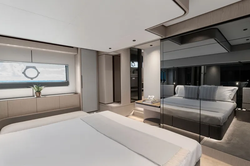 Slide: The Image of Luxurious bedroom interior of 2025 Ferretti Yachts 580, featuring modern design and ocean view. - 53