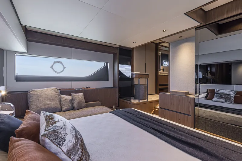 Slide: The Image of Luxurious interior of 2025 Ferretti Yachts 580, featuring elegant bedroom design and modern furnishings. - 28