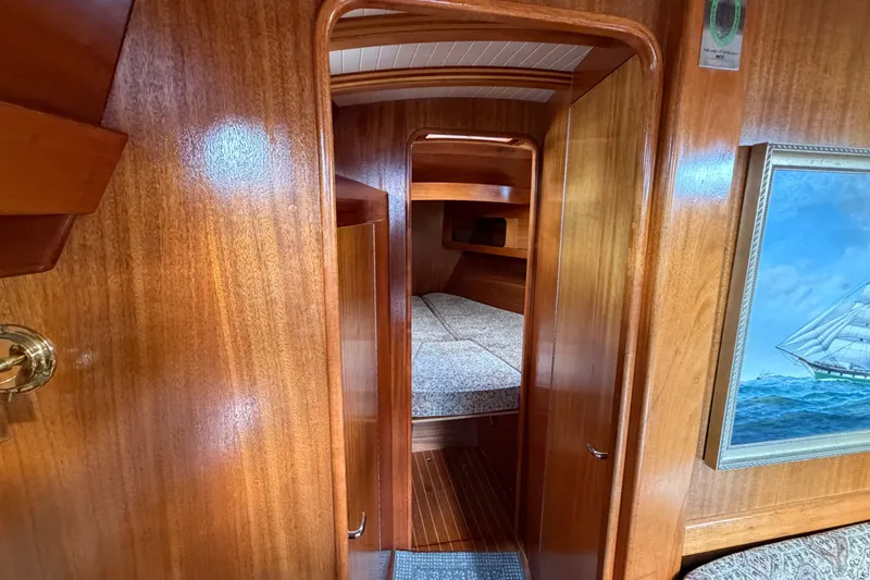 Slide: The Image of Interior of 1987 Vindo 45 sailboat with wooden finish and cozy cabin. - 44