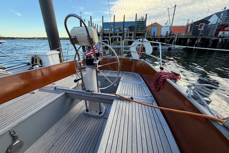 Slide: The Image of Cockpit of 1987 Vindo 45 sailboat with wooden deck and steering wheel. - 20