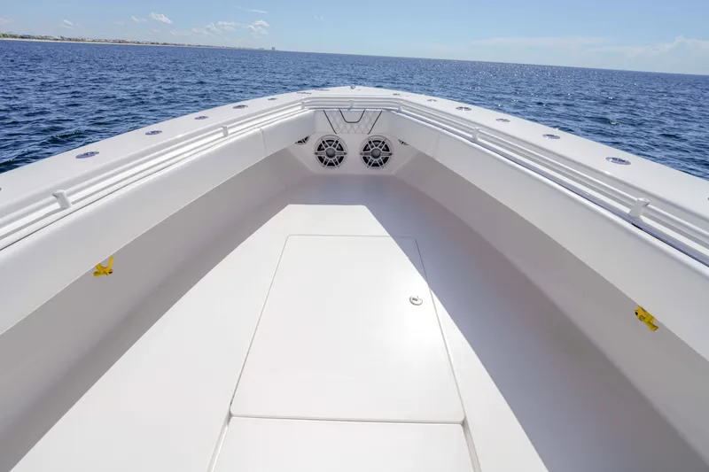 Slide: The Image of 2024 Contender 44 CB boat deck with ocean view, featuring sleek design and spacious layout. - 12