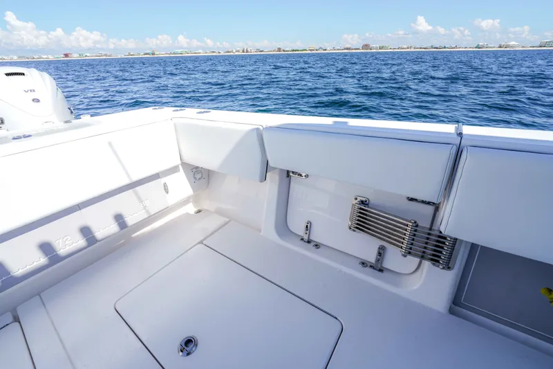 Slide: The Image of 2024 Contender 44 CB boat deck with ocean view and clear skies. - 26