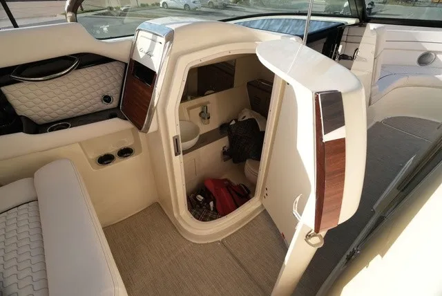 Slide: The Image of Interior of a 2026 Chris-Craft Launch 35 GT Sterdrive with elegant seating and storage space. - 44