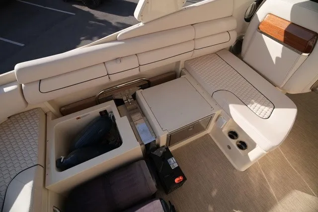 Slide: The Image of Interior of a 2026 Chris-Craft Launch 35 GT Sterdrive with sleek seating and storage compartments. - 17