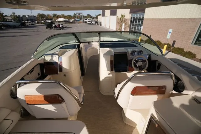 Slide: The Image of Interior view of a 2026 Chris-Craft Launch 35 GT Sterdrive with sleek seating and modern cockpit. - 30