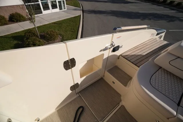 Slide: The Image of The image shows the stern of a 2026 Chris-Craft Launch 35 GT Sterdrive with elegant details. - 21