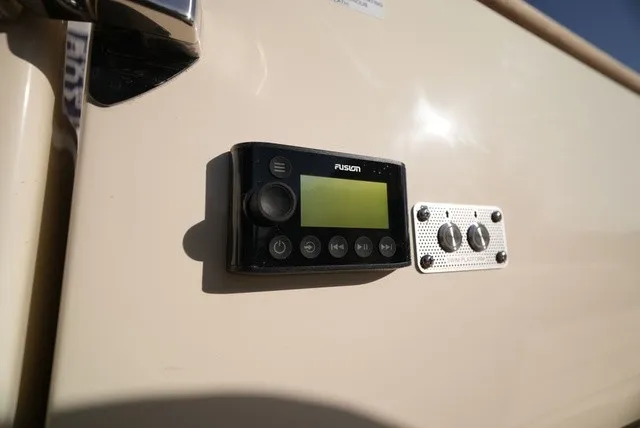 Slide: The Image of A Fusion audio system is mounted on the wall of a 2026 Chris-Craft Launch 35 GT Sterdrive. - 22