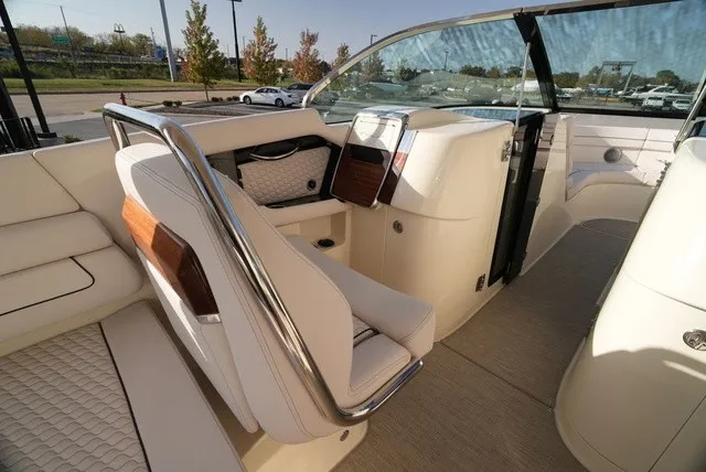 Slide: The Image of The image shows the cockpit of a 2026 Chris-Craft Launch 35 GT Sterdrive with sleek seating and wood accents. - 40
