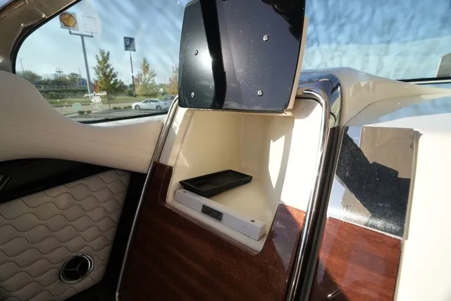 Slide: The Image of Interior of a Chris-Craft Launch 35 GT Sterdrive with stylish wood and leather design. - 43