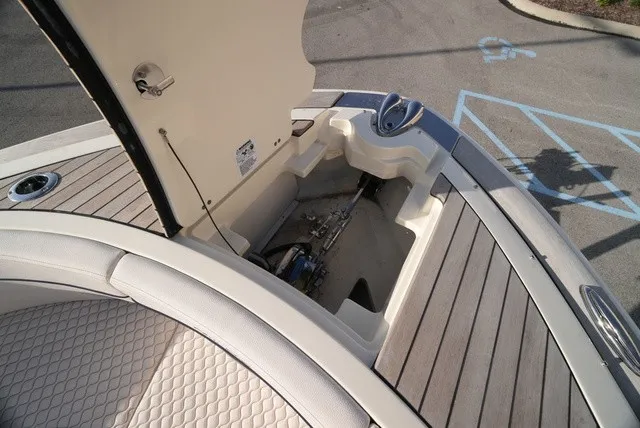 Slide: The Image of The image shows the bow of a 2026 Chris-Craft Launch 35 GT Sterdrive with storage space. - 50