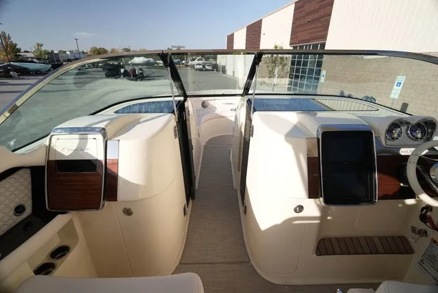 Slide: The Image of The image shows the cockpit of a 2026 Chris-Craft Launch 35 GT Sterdrive with sleek controls. - 46