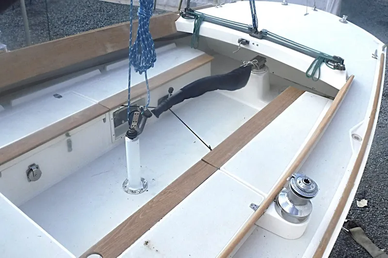 Slide: The Image of Cockpit of a 1997 Alerion Express 28 sailboat with wooden trim and rigging. - 13