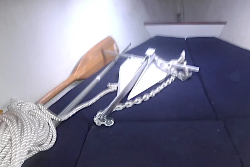 Slide: The Image of Interior of 1997 Alerion Express 28 sailboat with anchor, chain, and rope. - 47
