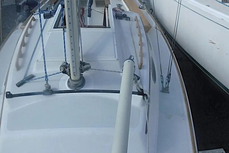 Slide: The Image of 1997 Alerion Express 28 sailboat deck with mast and rigging details. - 24