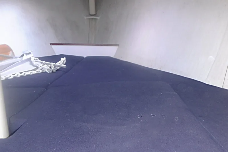Slide: The Image of Interior of a 1997 Alerion Express 28 sailboat with anchor chain. - 45