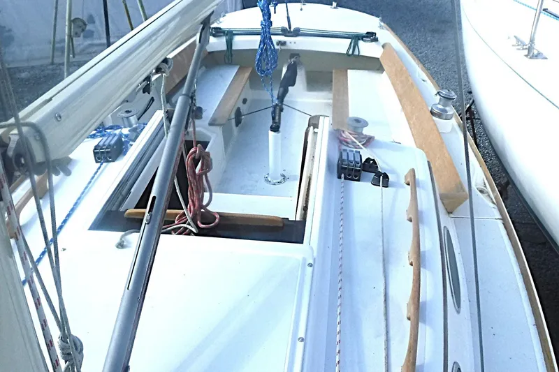 Slide: The Image of 1997 Alerion Express 28 sailboat cockpit with ropes and winches. - 26