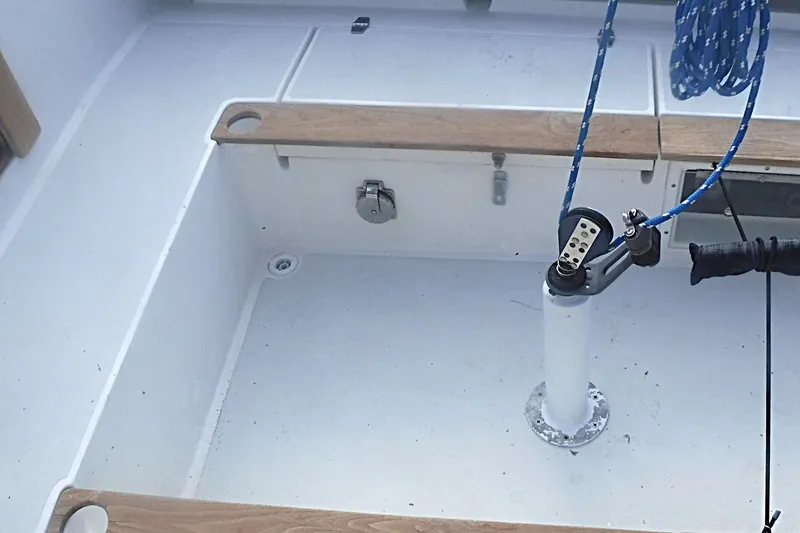 Slide: The Image of Cockpit of a 1997 Alerion Express 28 sailboat with wooden trim and rigging. - 15