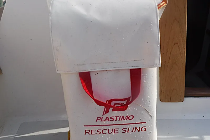 Slide: The Image of Plastimo rescue sling on 1997 Alerion Express 28 sailboat, safety equipment detail. - 20