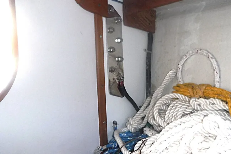 Slide: The Image of Interior of 1997 Alerion Express 28 sailboat with ropes and wiring. - 48