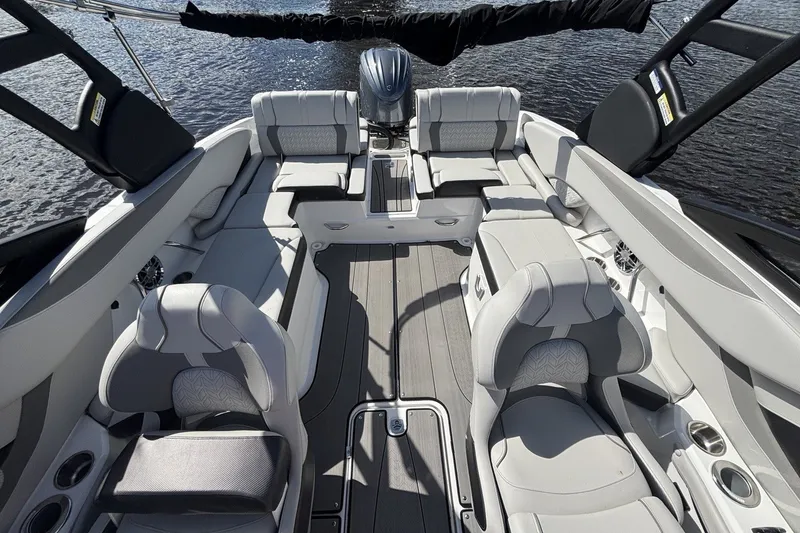 Slide: The Image of 2024 Hurricane SunDeck 2600 OB boat interior with spacious seating and modern design. - 6