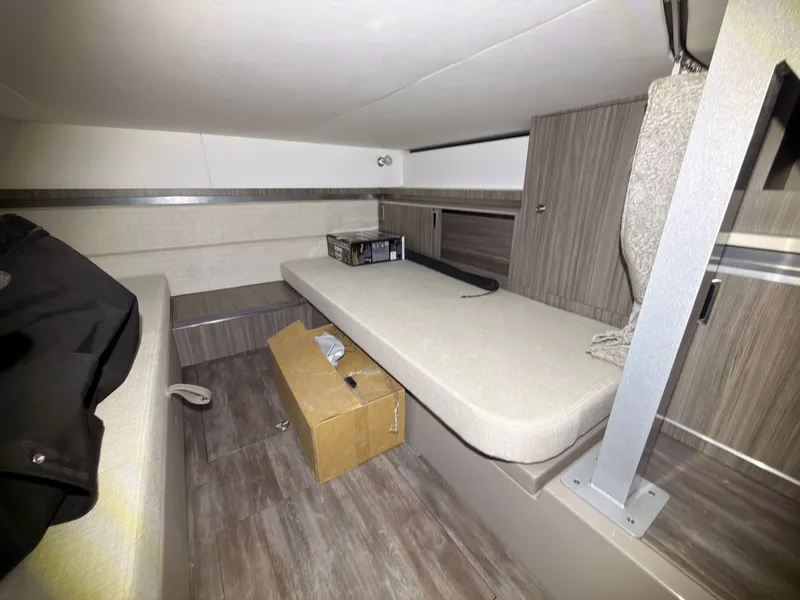 Slide: The Image of Interior of a Sea Ray Sundancer 320 Outboard with modern design and wood accents. - 40
