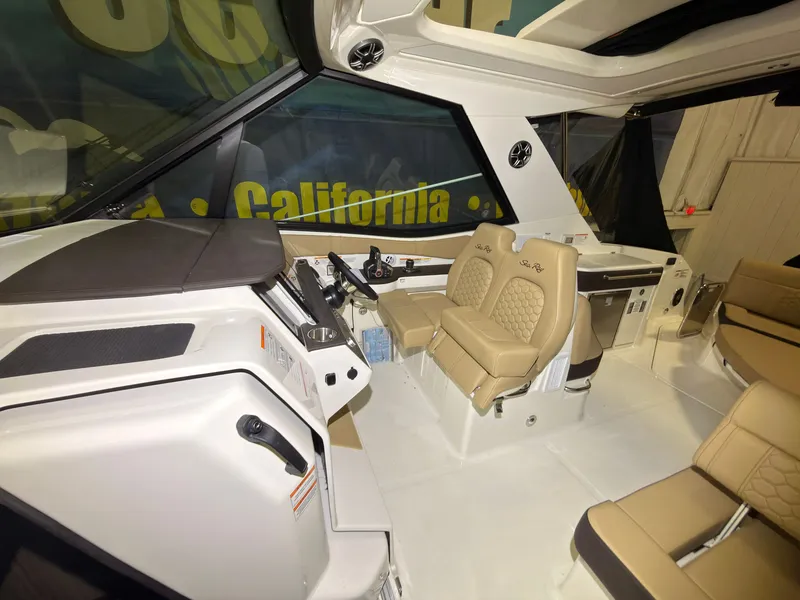 Slide: The Image of Interior of a modern yacht with beige leather seats and a sleek helm station. - 15