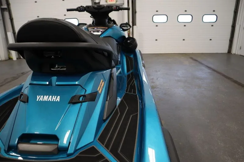 Slide: The Image of 2025 Yamaha WaveRunner FX Cruiser SVHO in a garage, showcasing sleek design and vibrant color. - 19