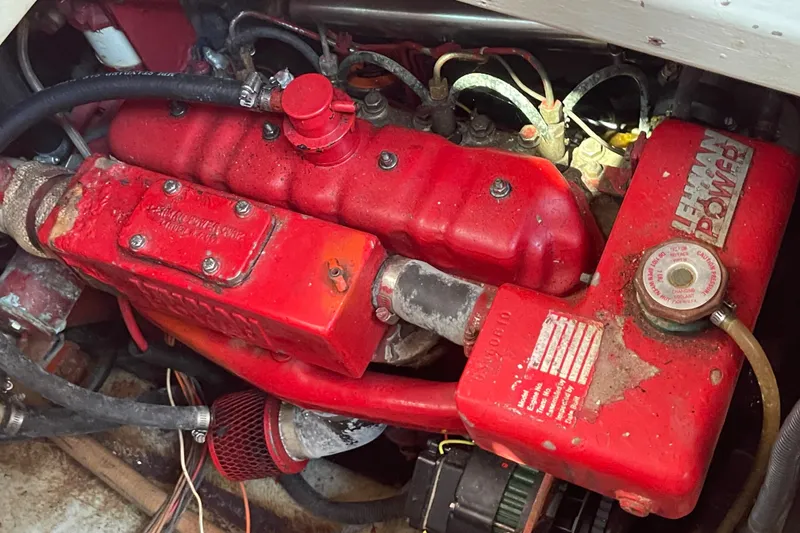 Slide: The Image of Red Lehman engine in a 1986 Slocum 43 sailboat, showing detailed components. - 50