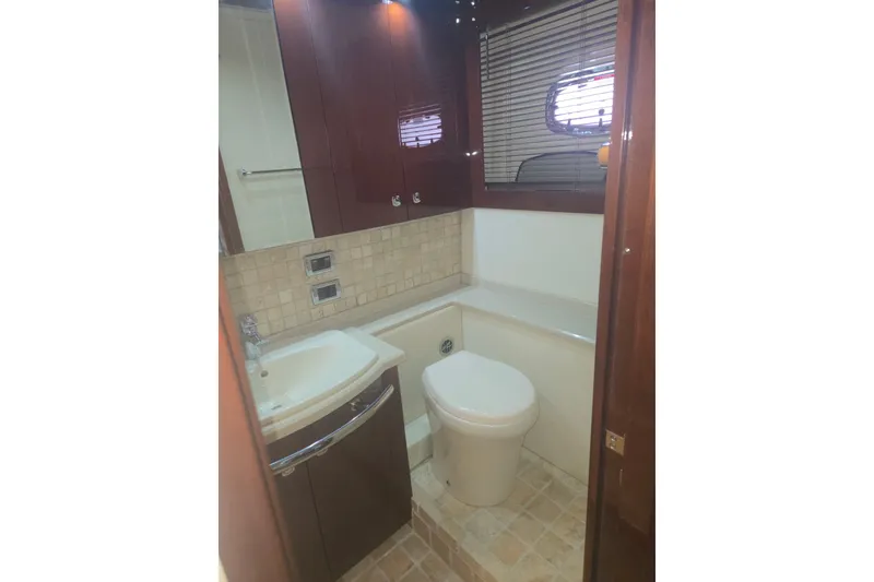 Slide: The Image of Luxurious bathroom in 2010 Sea Ray 580 Sundancer yacht with modern fixtures. - 61