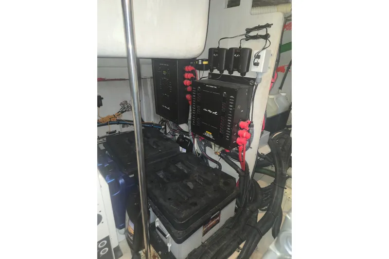 Slide: The Image of Electrical system of a 2010 Sea Ray 580 Sundancer yacht, featuring batteries and wiring. - 69