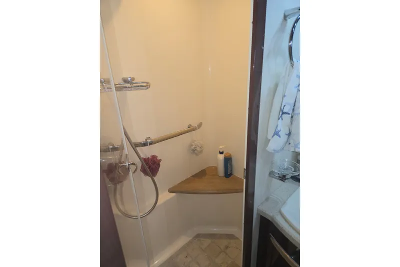 Slide: The Image of Shower area in 2010 Sea Ray 580 Sundancer yacht bathroom. - 65