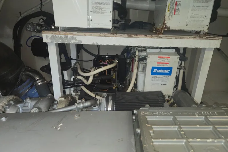 Slide: The Image of Engine room of 2010 Sea Ray 580 Sundancer with Cruisair system and mechanical components. - 81