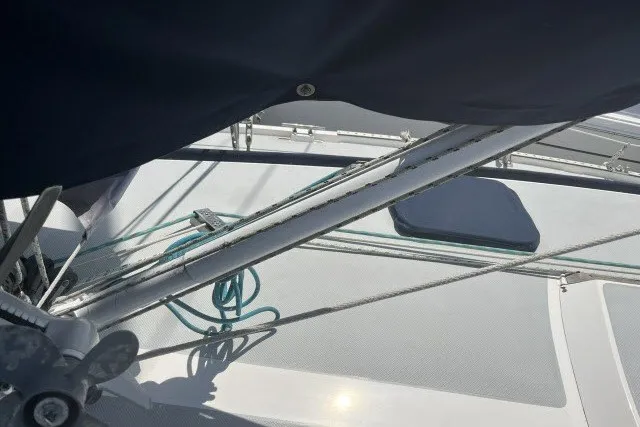 Slide: The Image of Deck view of a 1990 Catalina 42 sailboat with rigging and hatch. - 35